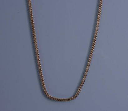 null Curb chain chain in 18 ct. gold 
P: 8,7 g. 
 Sold at 14,40 % legal costs