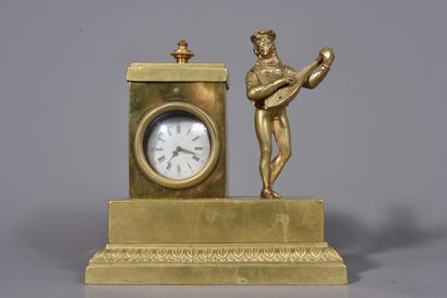 null A gilt brass BORNE HOLDER decorated with a lute player. It discovers an inkwell...
