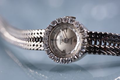 null REGLIA. Lady's wristwatch. Case and bracelet in 18K white gold. Stained silver...
