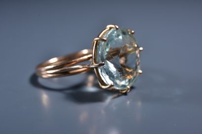 14 ct gold ring set with a large round aquamarine....