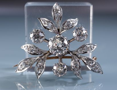 null 18 ct gold and platinum brooch set with a 1.82 ct main brilliant of old cut...