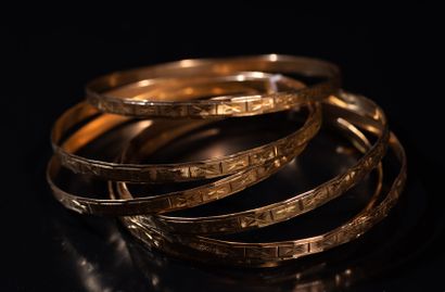 null SIX 18k yellow gold BRACELETS with engraved decoration. In R. P: 54.5 g