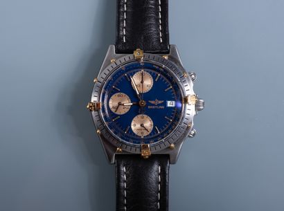 null BREITLING. Men's steel CHRONOGRAPHIC WATCH. Blue dial with triple counters and...