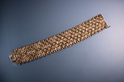 null LARGE BRACELET with fancy links in 18 ct gold. Width: 3 cm. In RF. P: 54 gr