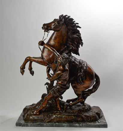 null D'après Guillaume I COUSTOU (1677-1746) "Cheval de Marly" Bronze à patine brune....