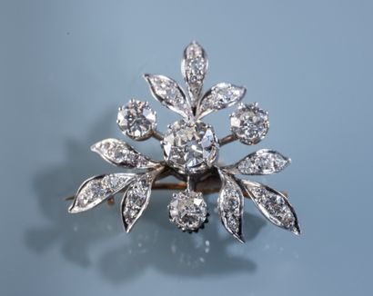null 18 ct gold and platinum brooch set with a 1.82 ct main brilliant of old cut...
