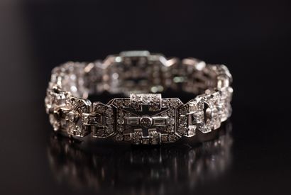 null BRACELET ARTICULE in platinum with geometrical motifs set with old-cut brilliants...