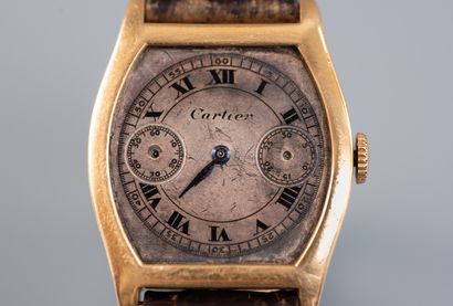  CARTIER. Turtle model wristwatch. Case and buckle in 18 ct yellow gold. 
Dial with...