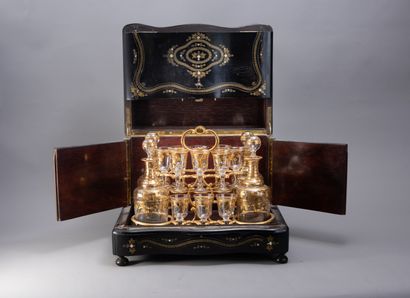 null LIQUEUR CELLAR in blackened pearwood and veneer with brass and mother-of-pearl...