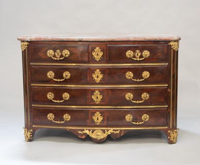 < REGENCE] A rosewood veneered LOUIS XIV COMMODE opening with five drawers on four...