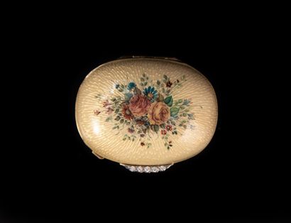 A pretty enamelled gold PILLS BOX with flowers...