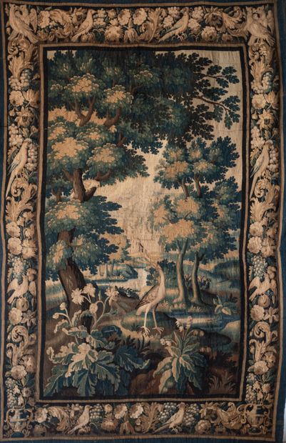 null AUBUSSON. Woolen tapestry. Verdure decorated with a wader surrounded by a luxuriant...