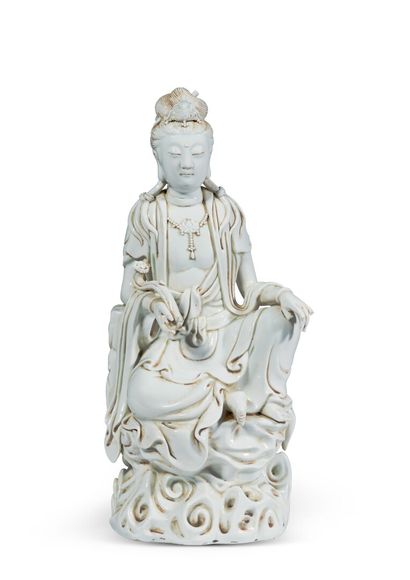 null CHINE - XXe siècle

Groupe en porcelaine émaillée blanc de Chine, Guanyin assise...