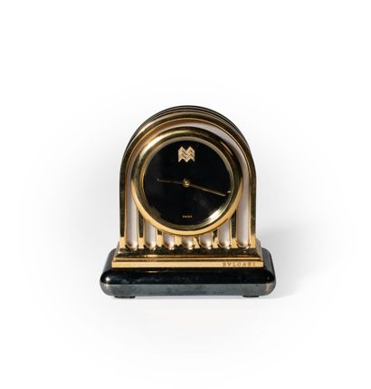 null BULGARI.

 "Duomo" - Gilt and silver plated metal PENDULETTE, base is blackened...