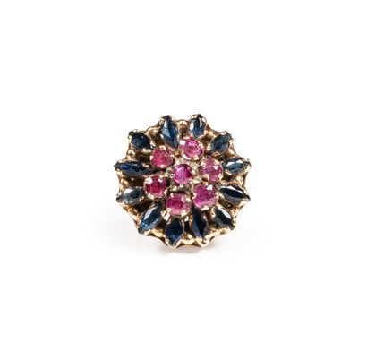 null Dome ring in 18 ct yellow gold set with round pink sapphires and blue sapphires....
