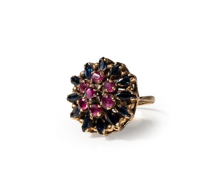 null Dome ring in 18 ct yellow gold set with round pink sapphires and blue sapphires....