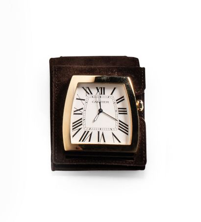 null CARTIER. La Dona travel clock with gilt metal dial and winding mechanism inlaid...