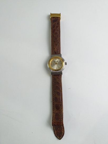 null BOUCHERON

REFLET.

Steel woman's wristwatch. Round case, bezel in 18K gold....