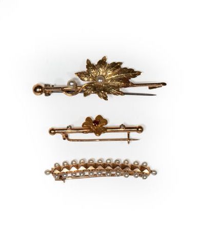 THREE 18 ct yellow gold PINS, one decorated...