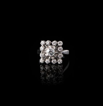 null 18k white gold and platinum ring set with a central 0.25 ct old-cut brilliant...