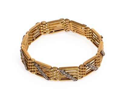 BRACELET articulated in yellow gold with...