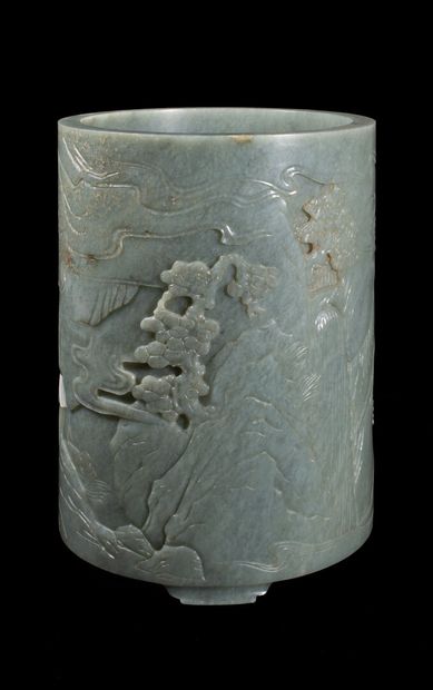  Porte-pinceaux en jade céladon et brun à décor de paysages 
Chine, Dynastie Qing...