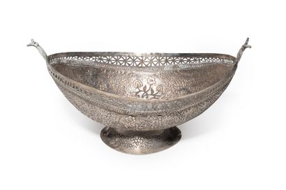 null BURMA OBLONG CUP on foot in silver embossed with flowers and snakes, openwork...