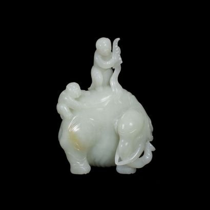 null CHINA - Qing dynasty

Group in celadon nephrite, two children on the back of...