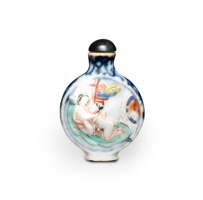 null CHINA - 19th century

A polychrome enameled porcelain snuff bottle of round...