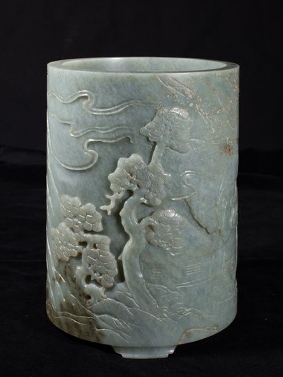 null Celadon and brown jade brush holder with landscape decoration

China, Qing Dynasty...