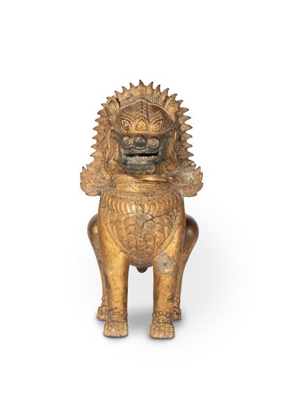 null THAILANDE - XXe siècle

Statuette de lion en bronze laqué or, campé sur ses...