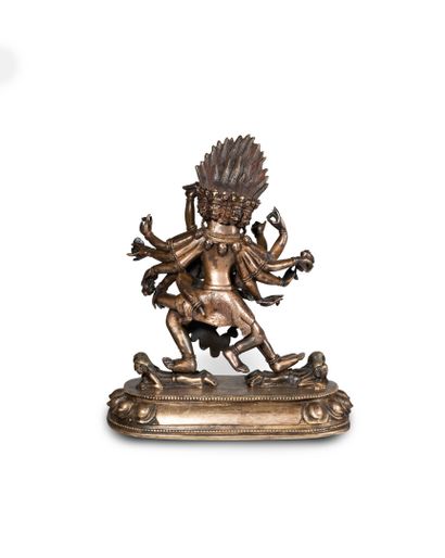 null TIBET

Statuette de Mahakala en bronze doré à quatorze bras, sept têtes et quatre...