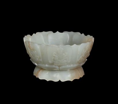 Seven-petalled jade bowl on foot with relief...