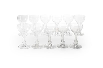 null In the taste of BACCARAT 

ELEVEN crystal glasses with hollow leg. 

H. 13 ...