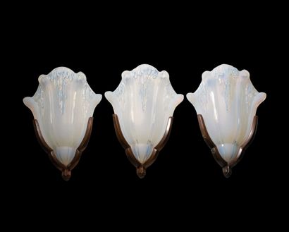 null CRYSTAL FACTORY OF EZANVILLE. Three sconces of angles tulips out of pressed...