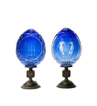 null FABERGE Meeting of two blue cut crystal EGGS, one decorated with a couple and...
