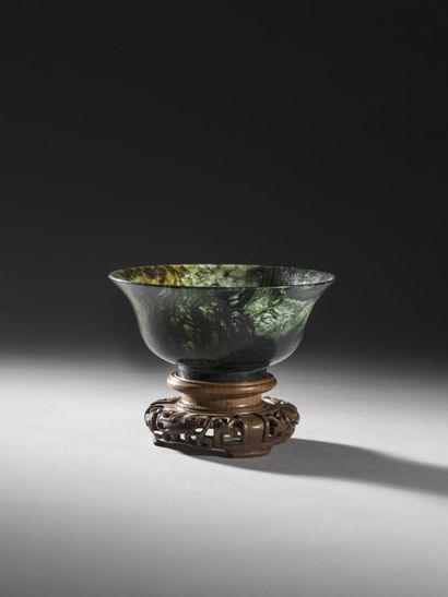 null Vase couvert en malachite de forme balustre aplatie

Chine, début du XXème siècle...
