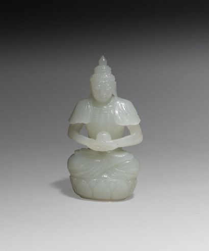 Statuette en jade blanc d'Amitayus assis

Chine,...