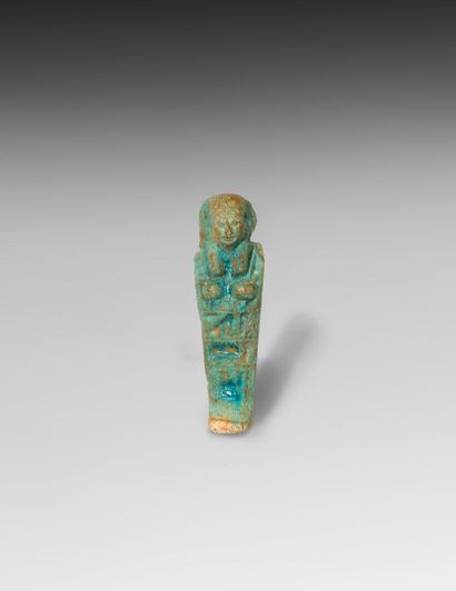 null SMALL OUSHEBTI in frit with turquoise glaze

Egypt, archaic period?

H. 5,2...
