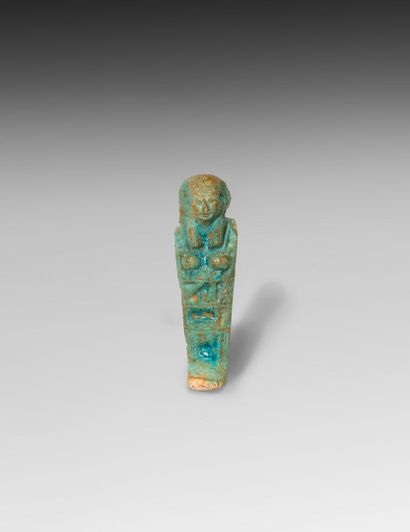 null PETIT OUSHEBTI en fritte à glaçure turquoise

Egypte, époque archaïque?

H....