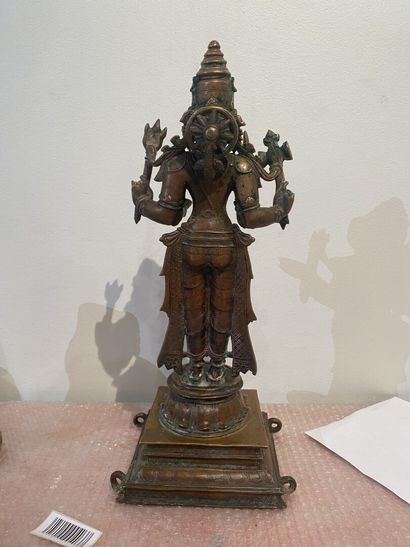 null Copper alloy statue of Parvati standing on a lotiform base and square base

India,...
