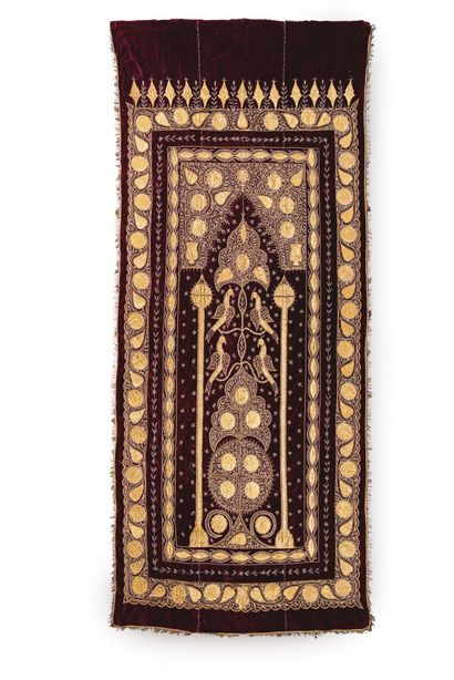 null Le velvet embroidered with gold thread depicting a tree of life decorated with...