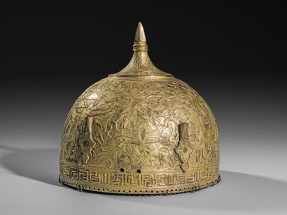 null Helmet in gilded and chased metal

decorated with hunting scenes with animals...