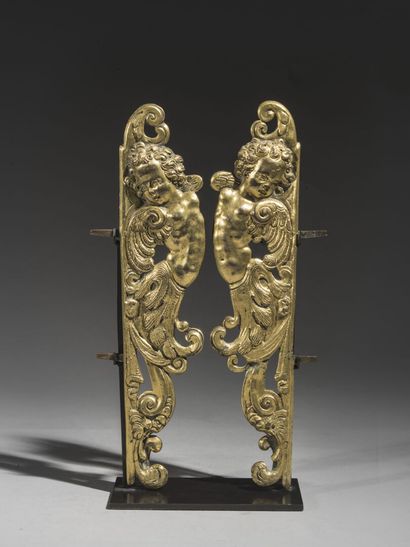 null Deux éléments d'applique en cuivre doré 

Italie, XVIIe siècle

provenant probablement...