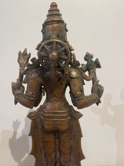 null Copper alloy statue of Parvati standing on a lotiform base and square base

India,...