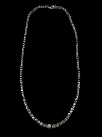 null Diamond river necklace 
articulated in white gold 750°/00 set with 122 falling...