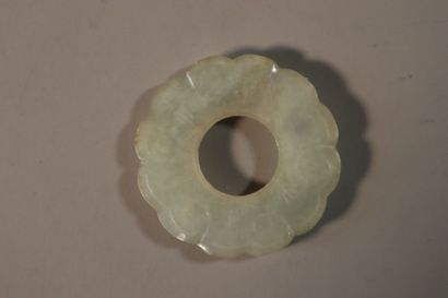 null CHINA, QING Dynasty (1644 - 1911)
A celadon and rust jade (nephrite) pebble...