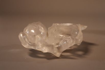 null CHINA, 19th century
A rock crystal brush washer in the shape of two digested...