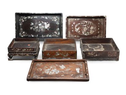null VIETNAM, About 1900
Set of six wooden trays 
decorated with mother-of-pearl...