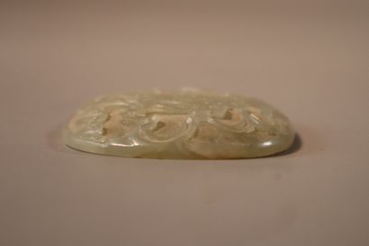 null CHINA, 19th century
Three celadon jade (nephrite) ruyi plates, 
- two carved...